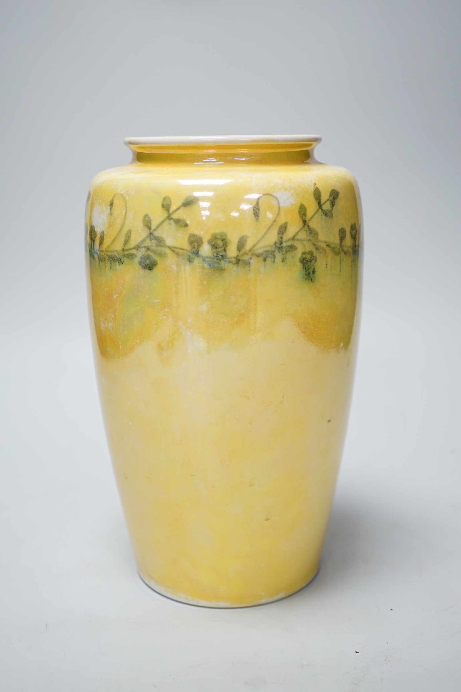 A Ruskin yellow waterglazed vase stamped and printed mark to base 1915, 21cm tall